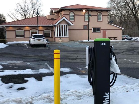 EV charger at Four Brothers Pizza Inn